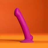 The Avant D9 Ergo MINI 6.5" Non-Porous Silicone Dildo by Avant, in violet, features a curved shape and flared base, crafted from body-safe silicone and shown upright against an orange background.